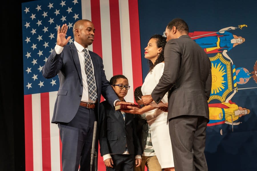 “I have a very diverse background,” said New York Lt. Gov. Antonio Delgado (left). “I’m Black. I’m Cape Verdean. I have Latino roots as well,” and his wife and children are Black and Jewish. He called the issue of hate and prejudice “very personal.” Above, Delgado is joined by his family on Jan. 1 as he is sworn in by Rep. Ritchie Torres (right). (Photo by Lev Radin/Pacific Press/LightRocket via Getty Images)