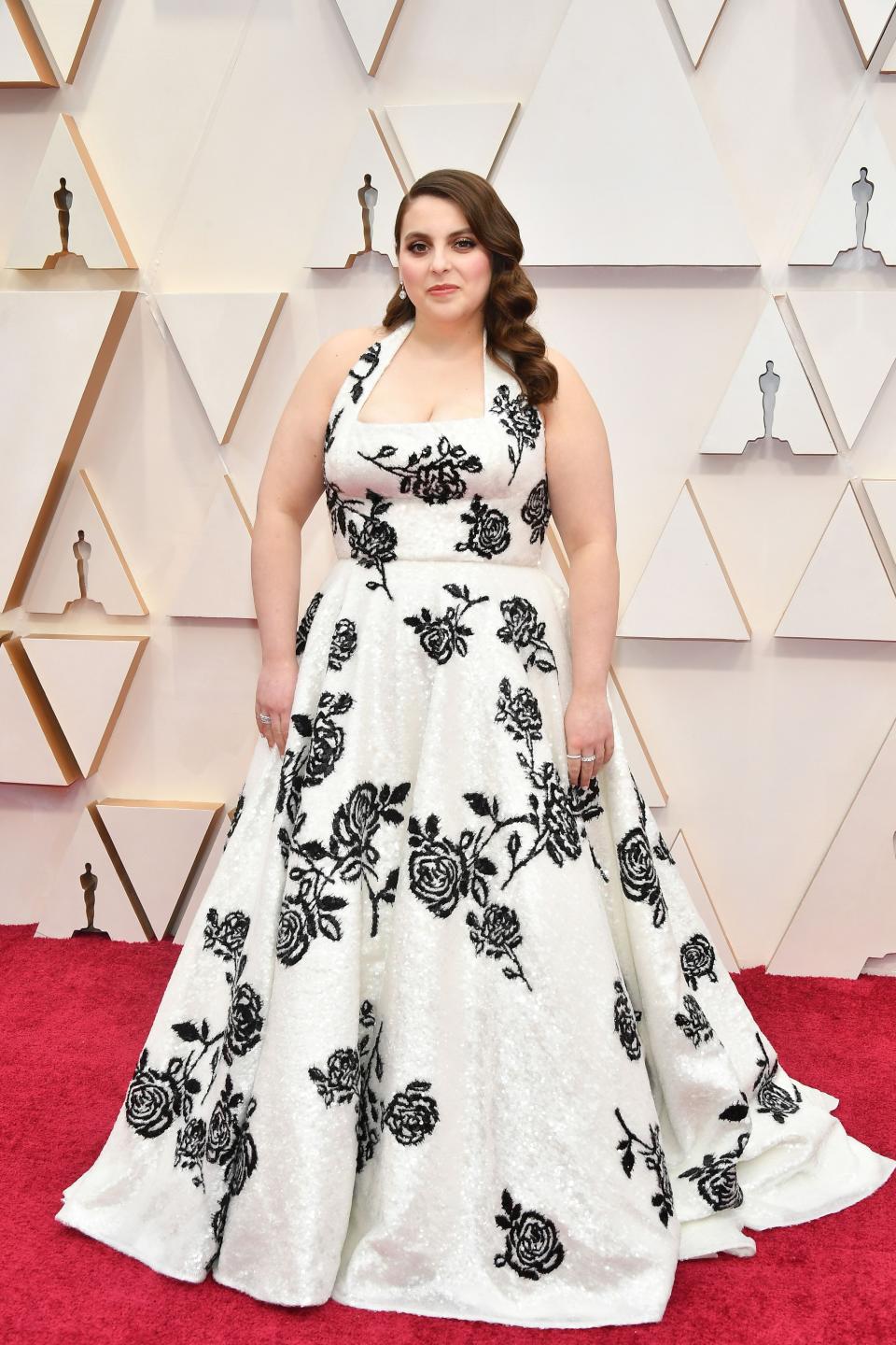 The "Booksmart" actress and Oscars presenter wore a custom monochrome gown by Miu Miu.