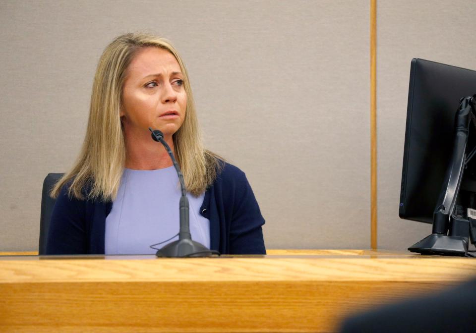 Fired Dallas police Officer Amber Guyger becomes emotional as she testifies in her murder trial on Sept. 27, 2019.