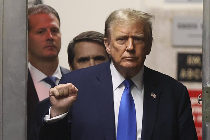Former President Donald Trump gestures as he returns to the courtroom from a recess during his criminal trial at Manhattan criminal court in New York on Thursday. Pool Photo by Brendan McDermid/UPI