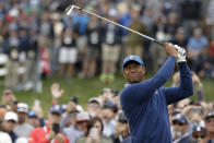 Tiger Woods watches his tee shot on the fourth hole during the second round of the U.S. Open golf tournament Friday, June 14, 2019, in Pebble Beach, Calif. (AP Photo/Marcio Jose Sanchez)