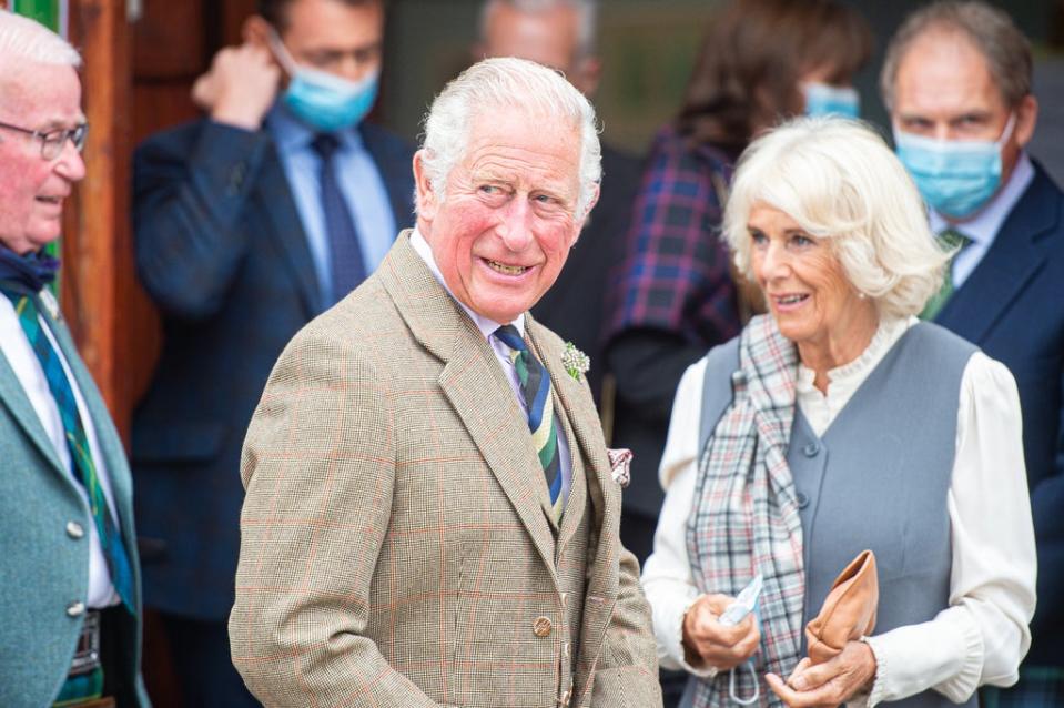 The Prince of Wales and the Duchess of Cornwall, known as the Duke and Duchess of Rothesay when in Scotland, on a walk through the village (Wullie Marr/DCT Media/PA) (PA Wire)