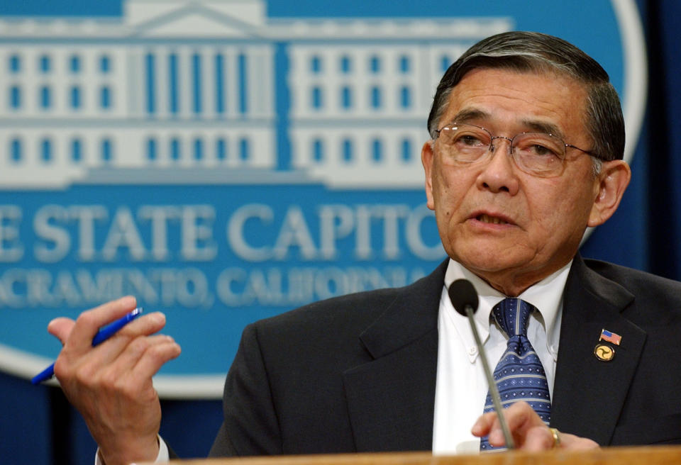 FILE - U.S. Transportation Secretary Norm Mineta speaks during a news conference in Sacramento, Calif., on March 31, 2005. Mineta, who as federal transportation secretary ordered commercial flights grounded after the 9/11 terror attacks in 2001, died Tuesday, May 3, 2022. He was 90. (AP Photo/Rich Pedroncelli, File)