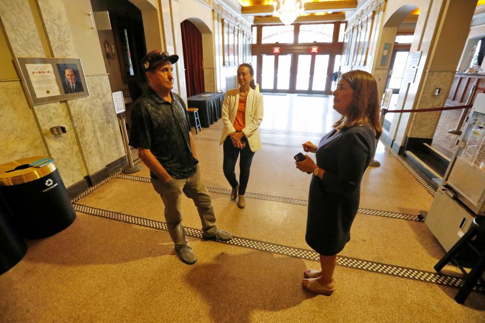 Pete Souza, Dartmouth native and famed Chief Official White House Photographer for President Obama, tours The Zeiterion Performing Arts Center with Executive Director Rosemary Gill, right, and Marketing Director Penny Pimentel, center.