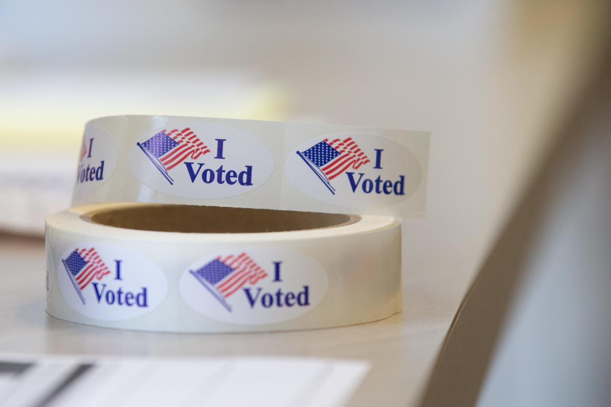 'I Voted' stickers are seen on a shelf for voters who cast their ballot Monday at the Shawnee County election office.