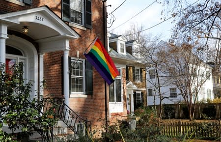 FILE PHOTO: Home flies rainbow flag in solidarity with LGBT community two doors down from U.S. Vice President-elect Pence's rental home in Washington