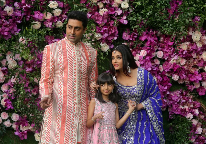 FILE PHOTO: Actor Abhishek Bachchan, his wife actress Aishwarya Rai and their daughter Aaradhya pose at the wedding ceremony of Akash Ambani, son of the Chairman of Reliance Industries Mukesh Ambani, at Bandra-Kurla Complex in Mumbai