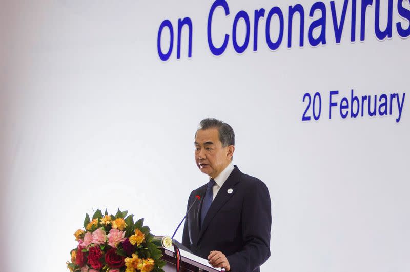 China's Foreign Minister Wang Yi speaks during a news conference after a meeting of foreign ministers of the Association of South East Asian Nations (ASEAN) and China about the coronavirus outbreak, in Vientiane