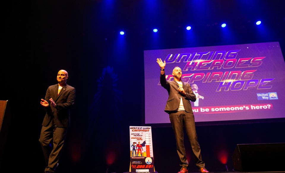 United Way of Lee, Hendry and Glades campaign co-chairs Kevin Karnes, right, and Jay Santos unveil the fundraising goal thermometer during its 2023-24 Campaign Kickoff at the Barbara B. Mann Performing Arts Hall in Fort Myers on Wednesday, Nov. 8, 2023.