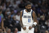 Dallas Mavericks guard Kyrie Irving (11) reacts after making a 3-pointer against the Sacramento Kings during the second half of an NBA basketball game in Sacramento, Calif., Tuesday, March 26, 2024. (AP Photo/José Luis Villegas)