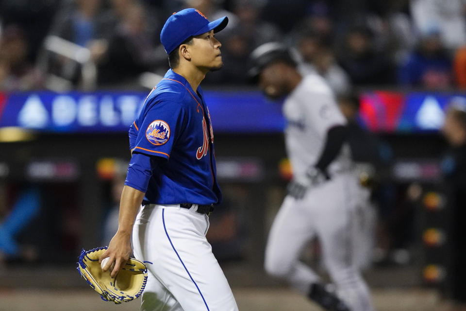 New York Mets starting pitcher Kodai Senga waits as Miami Marlins' Jesus Sanchez runs the bases on a home run during the fourth inning in the second baseball game of a doubleheader Wednesday, Sept. 27, 2023, in New York. (AP Photo/Frank Franklin II)