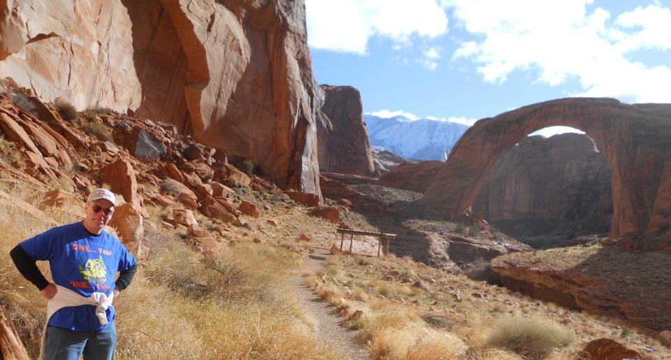 Thomas Wright, who visited every U.S. national park this year, walks on a trail to the Rainbow Bridge National Monument in Utah.