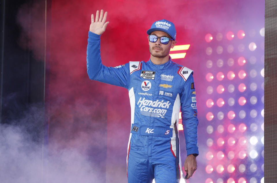 Kyle Larson waves during driver introductions before a NASCAR Cup Series auto race, Sunday, Oct. 15, 2023, in Las Vegas. (AP Photo/Steve Marcus)