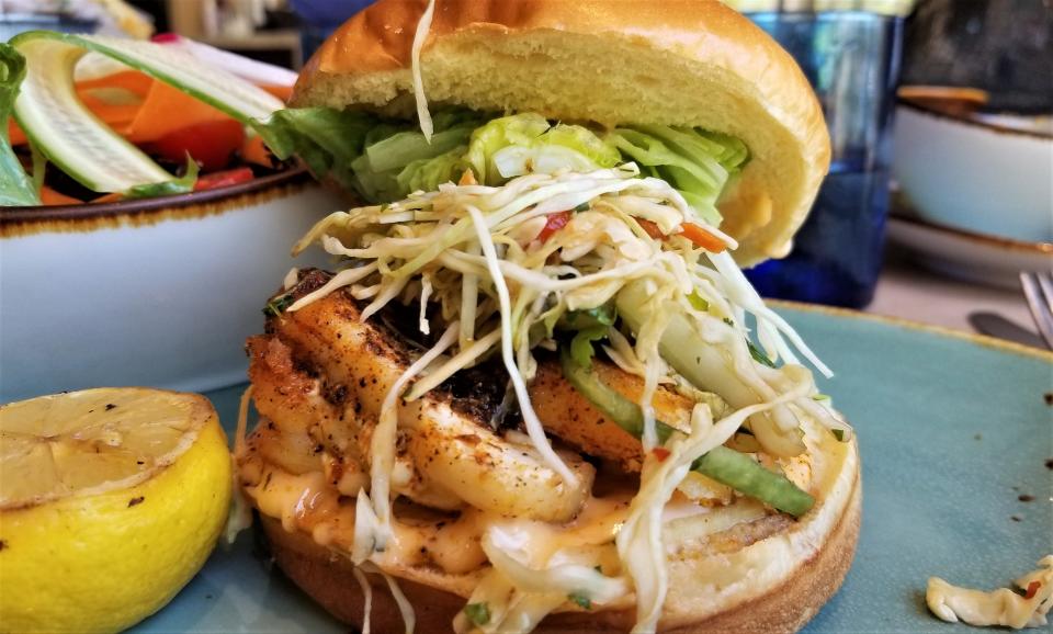 The grilled grouper sandwich, ordered blackened, with ponzu slaw and sriracha mayonnaise at jack Dusty at The Ritz-Carlton, Sarasota.