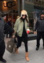 <p>The day after filming her first Victoria’s Secret Fashion Show, Jenner looked comfy-cozy for a shopping stop at the Ugg store with younger sister Kylie. The model wore a satiny, moss-green bomber jacket over an all-black outfit, as well as a suede trapper hat and Ugg boots that she seems to have purchased then and there. Could Jenner be the one to make Uggs cool again in the fashion crowd? </p>