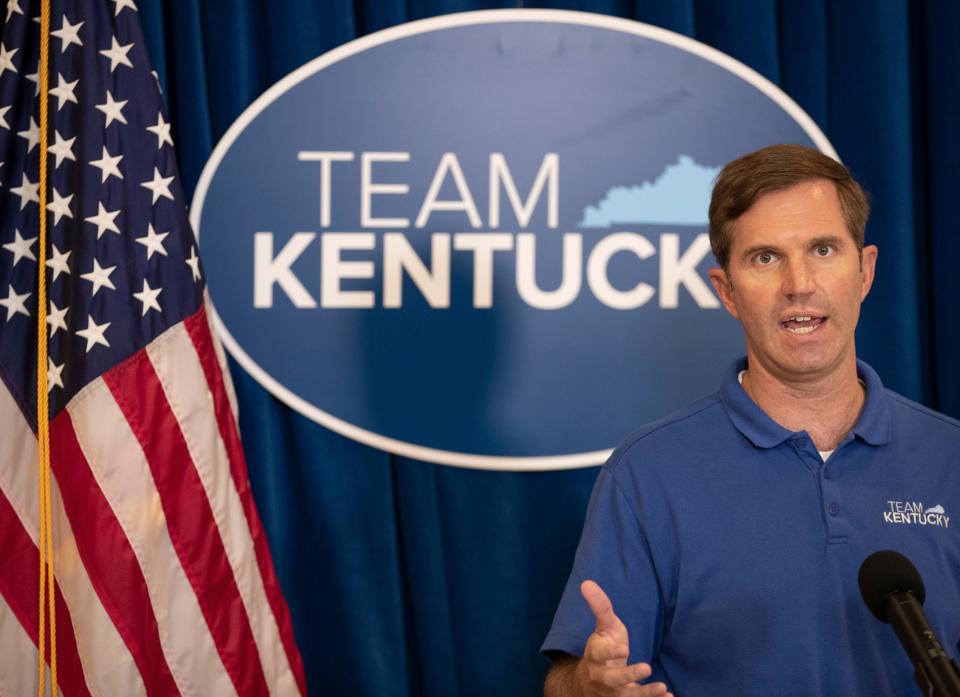 Kentucky Gov. Andy Beshear gives a grim assessment of the COVID-19 surge in Kentucky at the state Capitol. Aug. 27, 2021