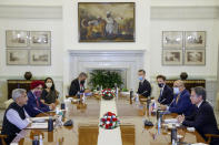 India's Foreign Minister Subrahmanyam Jaishankar, left, and U.S. Secretary of State Antony Blinken, right, deliver opening remarks as they sit down to meet at Hyderabad House in New Delhi, India Wednesday, July 28, 2021. (Jonathan Ernst/Pool Photo via AP)