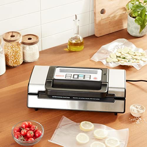 26) Deluxe Food VS-12 Vacuum Sealer