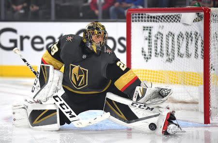 Apr 16, 2019; Las Vegas, NV, USA; Vegas Golden Knights goaltender Marc-Andre Fleury (29) makes a kick save against the San Jose Sharks during the first period of game four of the first round of the 2019 Stanley Cup Playoffs at T-Mobile Arena. Mandatory Credit: Stephen R. Sylvanie-USA TODAY Sports