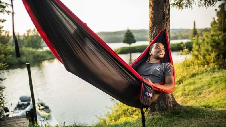This cozy hammock can accommodate two people at a time.