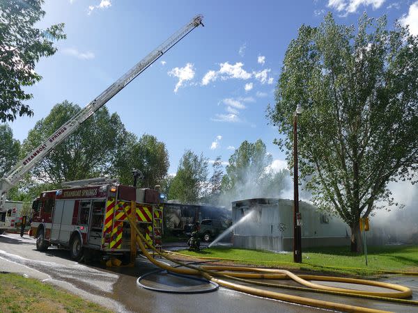 A twin-engine airplane that was believed to be on the way to Utah crashed into a Colorado mobile park on Monday, June 17, 2024, killing the passengers. All residents of the park were accounted for, according to officials. (Courtesy: Steamboat Springs Fire Rescue)