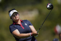 United States' Lilia Vu plays her tee shot on the 4th hole during her single match at the Solheim Cup golf tournament in Finca Cortesin, near Casares, southern Spain, Sunday, Sept. 24, 2023. Europe play the United States in this biannual women's golf tournament, which played alternately in Europe and the United States. (AP Photo/Bernat Armangue)