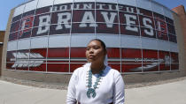 Lemiley Lane, a Bountiful junior who grew up in the Navajo Nation in Arizona, poses for a photograph at Bountiful High School, July 21, 2020, in Bountiful, Utah. While advocates have made strides in getting Native American symbols and names changed in sports, they say there's still work to do mainly at the high school level, where mascots like Braves, Indians, Warriors, Chiefs and Redskins persist. (AP Photo/Rick Bowmer)