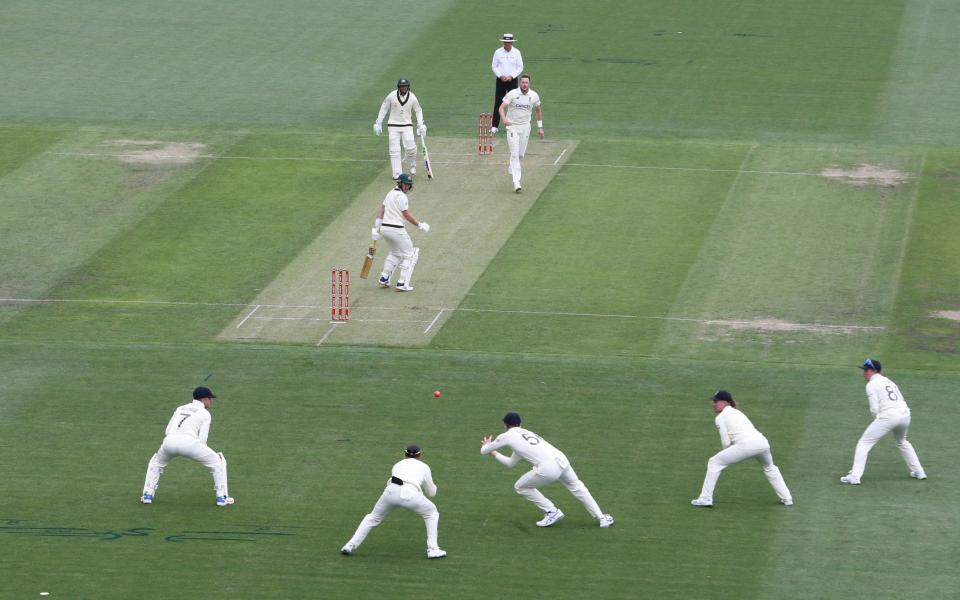 England's Zak Crawley (foreground, centre) drops a catch off the batting of Australia's Marnus Labuschagne -  Darren England via AAP/PA Wire