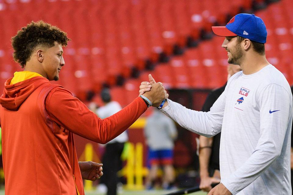 Kansas City Chiefs quarterback Patrick Mahomes, left, greets Buffalo Bills quarterback Josh Allen during pre-game warmups before an NFL football game, in Kansas City, Mo Bills Chiefs Football, Kansas City, United States - 10 Oct 2021