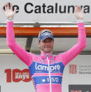 FILE PHOTO: Lampre's cyclist Alessandro Petacchi of Italy raises his arms on the podium after winning the 169.3 km second stage at the Tour of Catalunya cycling race in Banyoles March 22, 2011. REUTERS/Gustau Nacarino