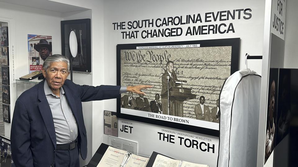 South Carolina civil rights photographer Cecil Williams shows a photograph he took of Thurgood Marshall at his museum, the only civil rights museum in the state, on Tuesday, Dec. 12, 2023, in Orangeburg, South Carolina. (AP Photo/Jeffrey Collins)