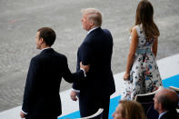 <p>French President Emmanuel Macron, President Donald Trump and First Lady Melania Trump attend the traditional Bastille Day military parade on the Champs-Elysees in Paris, France, July 14, 2017. (Photo: Gonzalo Fuentes/Reuters) </p>