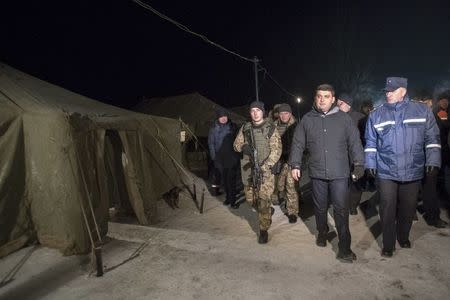 Ukrainian Prime Minister Volodymyr Groysman walks during a visit to the government-held industrial town of Avdiyivka, Ukraine January 31, 2017. REUTERS/Anastasia Sirotkina