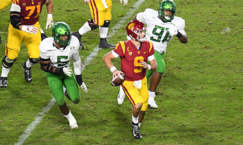 Kayvon Thibodeaux chases down Kedon Slovis.