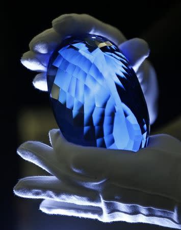 The Ostro stone, the largest known blue topaz stone, owned by philanthropist Maurice Ostro, is displayed to media at the Natural History Museum in London, Britain September 27, 2016. REUTERS/Peter Nicholls