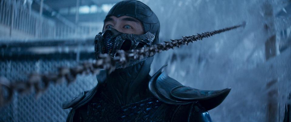 Sub-Zero avoid a Scorpion thrown shot in "Mortal Kombat."