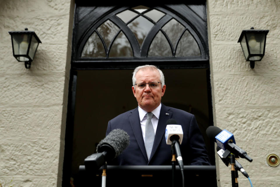 Morrison speaks during a media conference Friday, announcing his decision to attend global summit after saying Australia's quarantine requirements might keep him away. Source: Getty