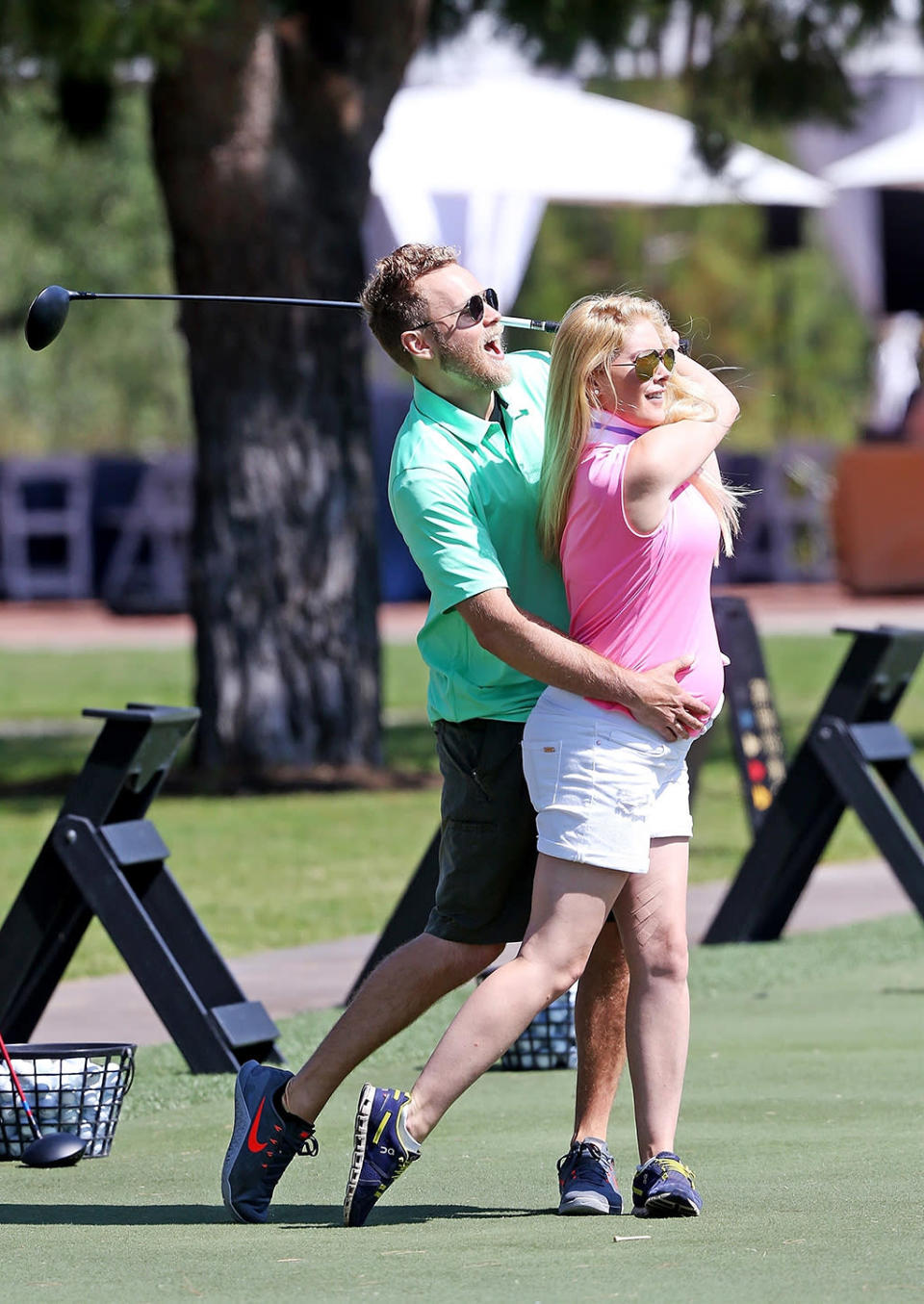 <p>However, the pregnancy has not kept Heidi from getting out there to hit the links and, of course, be photographed. After all, this is the couple that literally wrote the book on <a rel="nofollow noopener" href="https://www.amazon.com/How-Be-Famous-Looking-Becoming/dp/B003D7JTJU" target="_blank" data-ylk="slk:how to be famous" class="link rapid-noclick-resp">how to be famous</a>. (Photo: Mr Plow/BACKGRID) </p>
