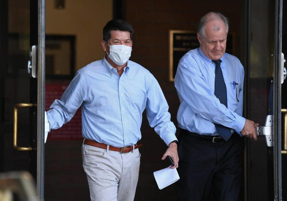 Former Fresno Congressman Terrance John “TJ” Cox, left, leaves the Fresno County Jail with his attorney Mark Coleman, at right, after pleading not guilty to federal fraud charges on Tuesday, Aug. 16, 2022 in Fresno.