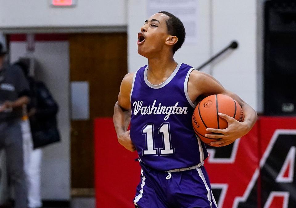 Washington Continentals Ammon Burns (11) yells in excitement on Tuesday, Jan. 18, 2022, at Cardinal Ritter High School in Indianapolis. The Washington Continentals defeated Cardinal Ritter, 63-54. 