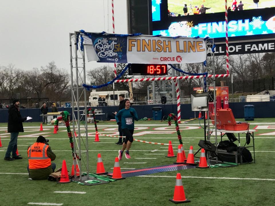 Emily Shaud, a teacher at Hoover High School, was the first female finisher (sixth overall) Saturday evening in the Spirit of the Season 5k at Tom Benson Hall of Fame Stadium. The race was part of the Holiday Kickoff presented by Hendrickson and Hall of Fame Resort & Entertainment Co., developers of the Hall of Fame Village powered by Johnson Controls.