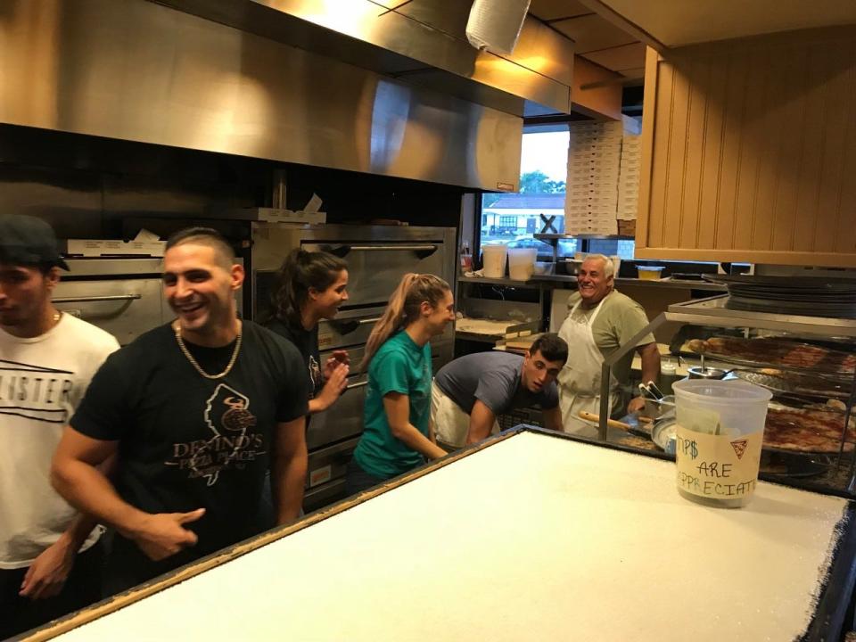 The staff at Denino's Pizza Place on Sept. 12, 2019, where Mike 