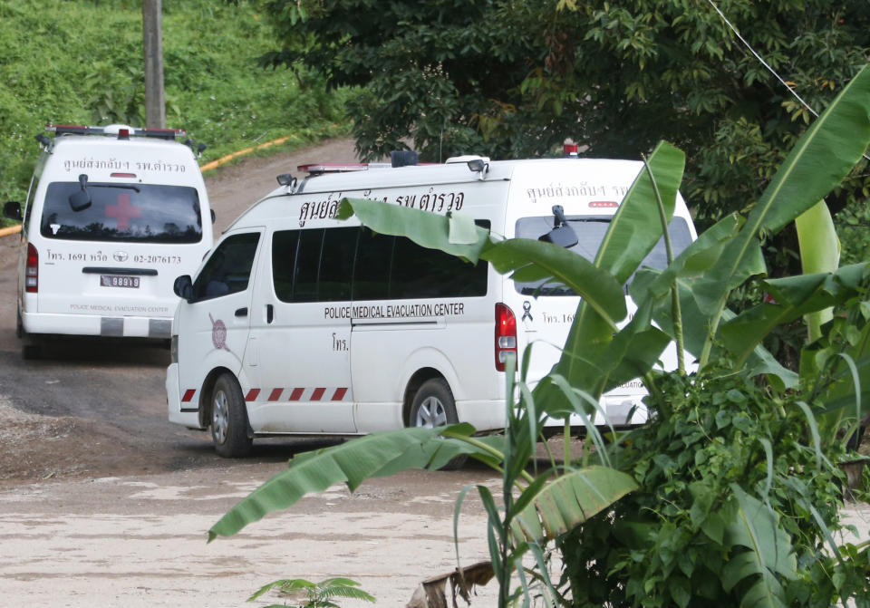 Two ambulances arrive near the cave to wait for more evacuations of the boys and their soccer coach who have been trapped since June 23. Source: AAP