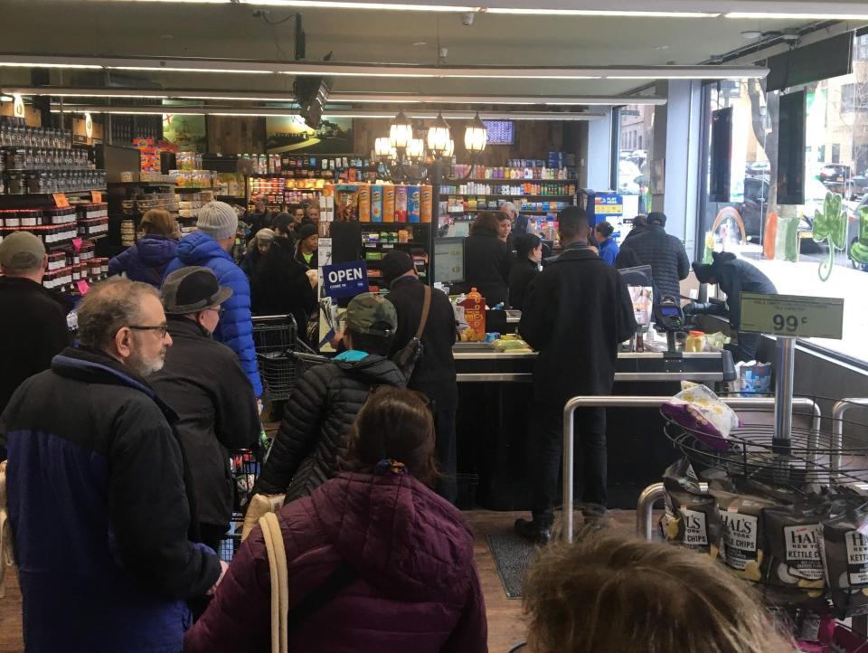 A crowded grocery store in New York City.