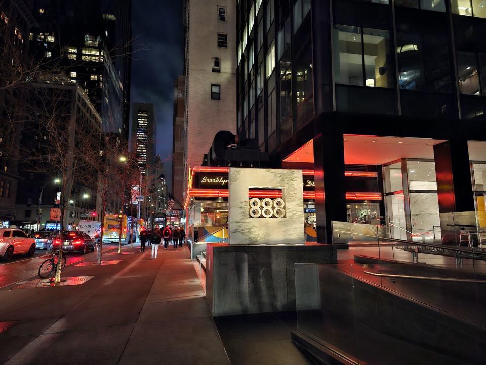 manhattan sidewalk and diner at night