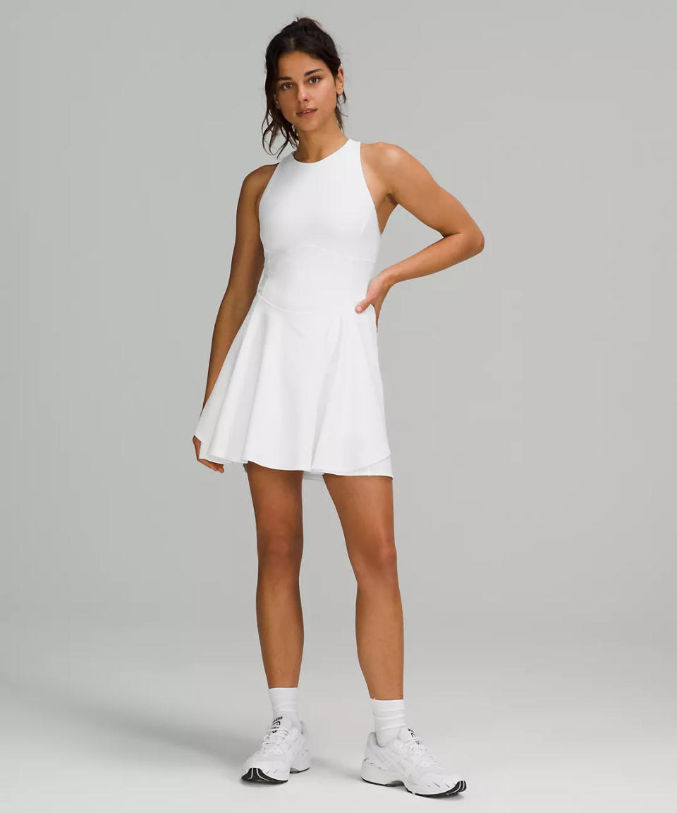 model wears Court Crush Dress in white