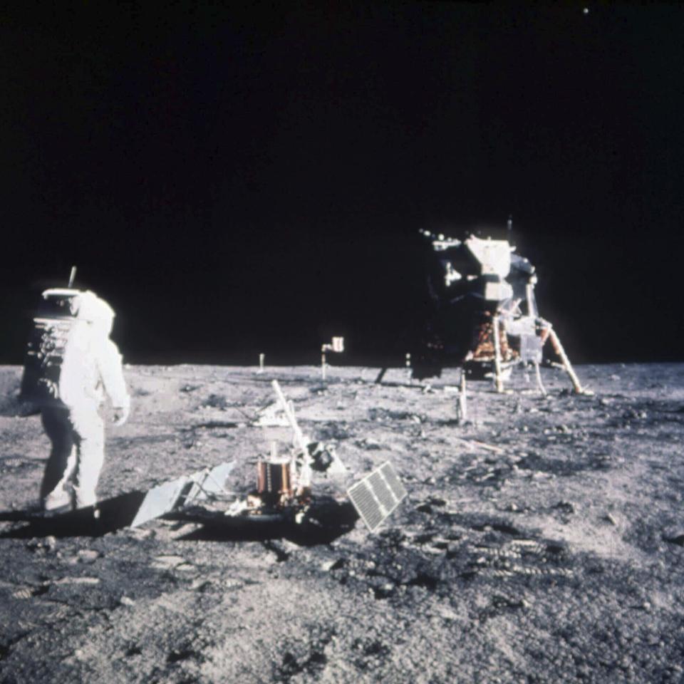 FILE- In this image released by NASA< Astronaut Edwin E. Aldrin Jr., lunar module pilot, stands on the lunar surface after the Apollo 11 moon landing on July 20, 1969. The Lunar Module is seen in the background. (AP Photo/File)