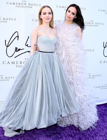 <p>Gilbert Flores/Variety via Getty Images</p> Dove Cameron and Sofia Carson at The Cameron Boyce Foundation's Cam For A Cause 3rd Annual Gala on June 2, 2024