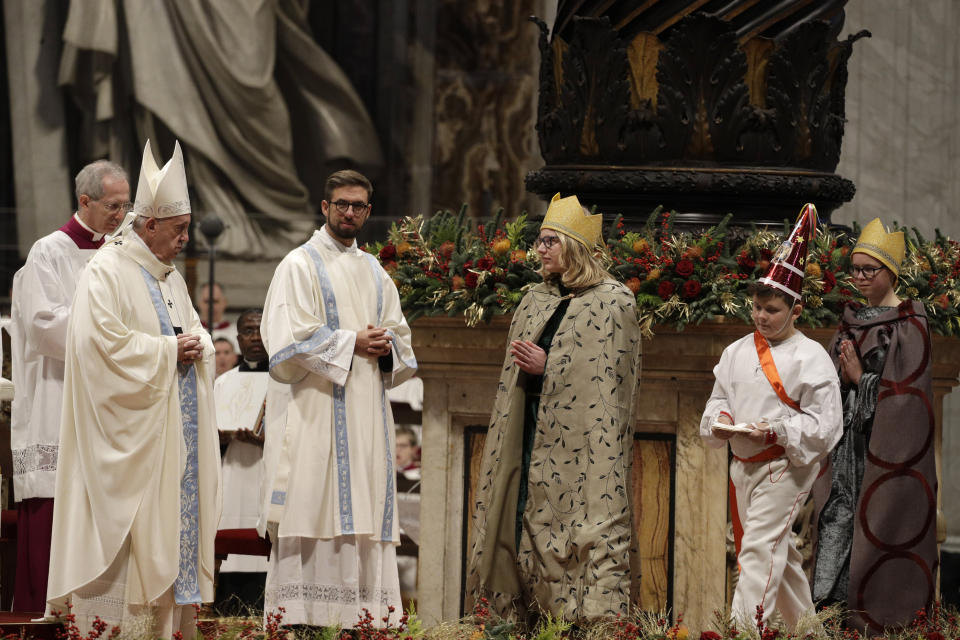 Pope Francis presides over a Mass for the solemnity of St. Mary at the beginning of the new year, in St. Peter's Basilica at the Vatican, Wednesday, Jan. 1, 2020. (AP Photo/Gregorio Borgia)