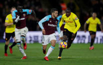 Soccer Football - Premier League - Watford vs West Ham United - Vicarage Road, Watford, Britain - November 19, 2017 West Ham United's Manuel Lanzini in action with Watford's Abdoulaye Doucoure Action Images via Reuters/Andrew Couldridge